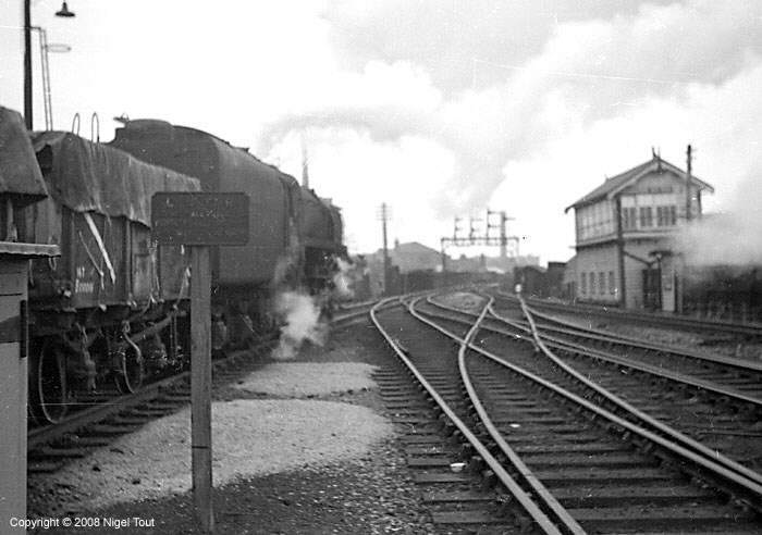 9F on freight train, departing Leicester Central