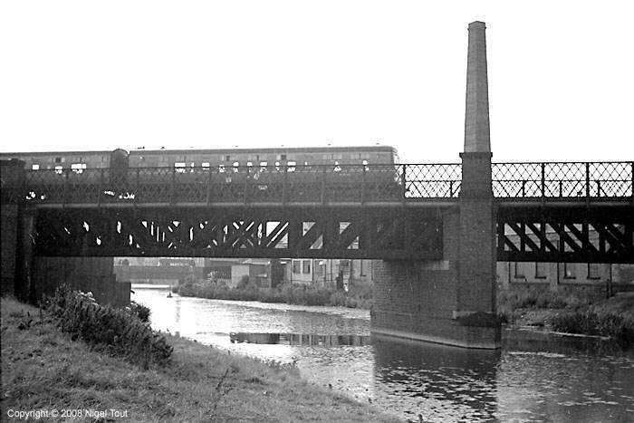 Passenger train to Nottingham, crossing the river Soar just north of Leicester Central station Passenger train to Nottingham, crossing the river Soar just north of Leicester Central station