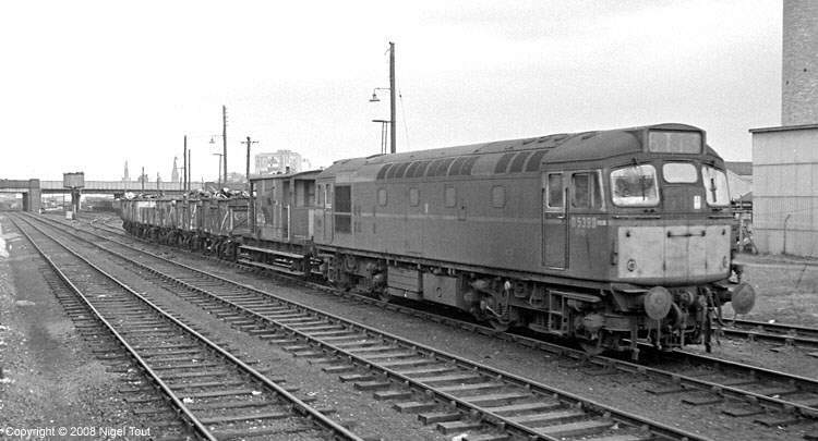 Class 27 diesel locomotive shunting wagons of scrap, Leicester Central goods yard