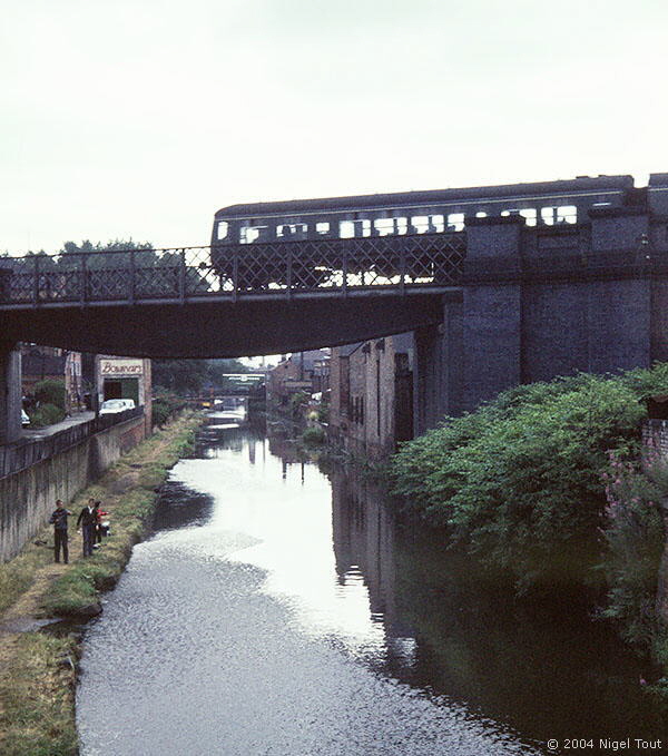 Passenger train to Nottingham, crossing the canal just north of Leicester Central station Passenger train to Nottingham, crossing the canal just north of Leicester Central station